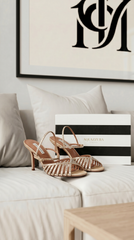 صندل "هولد مي" (Hold Me) من ماركة أكوازورا (Aquazzura) باللون البيج ومزين بالكريستال